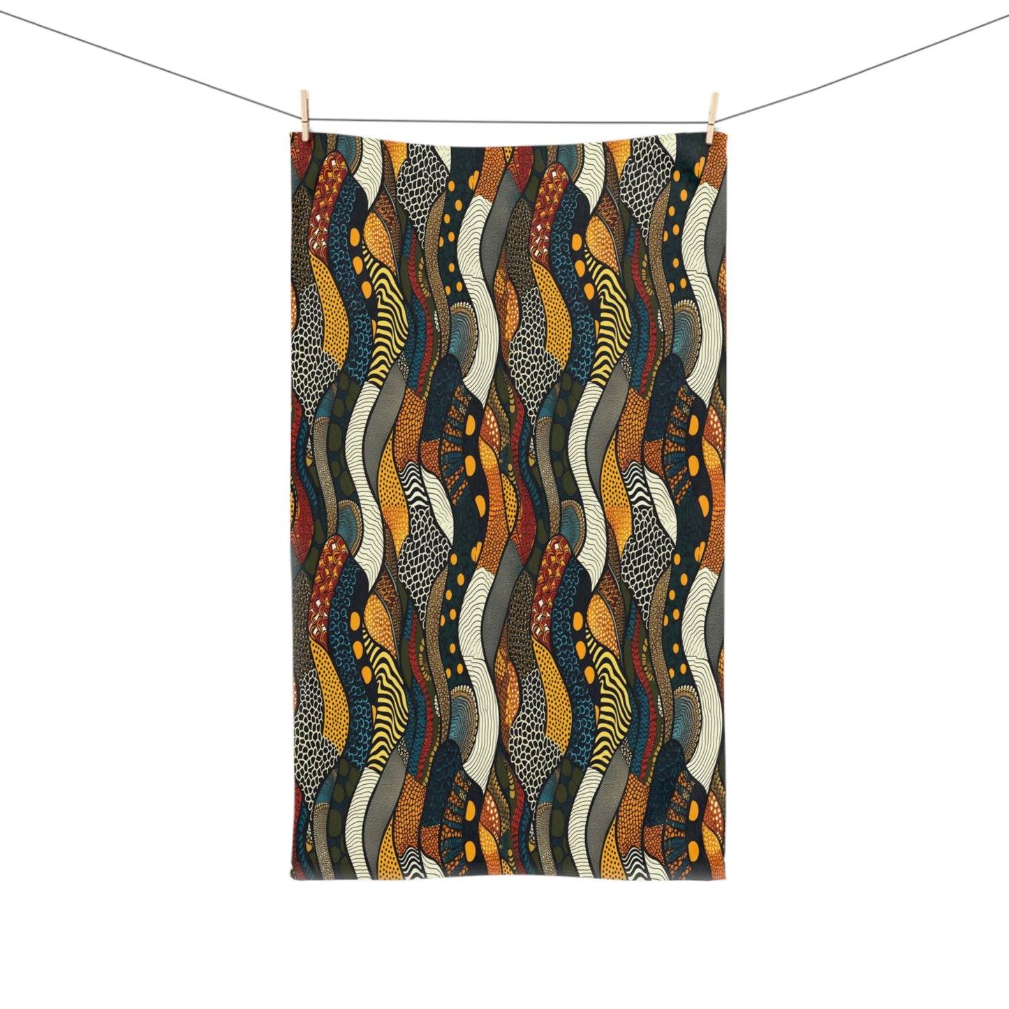 Colorful abstract patterned fabric hanging on a clothesline against a white background