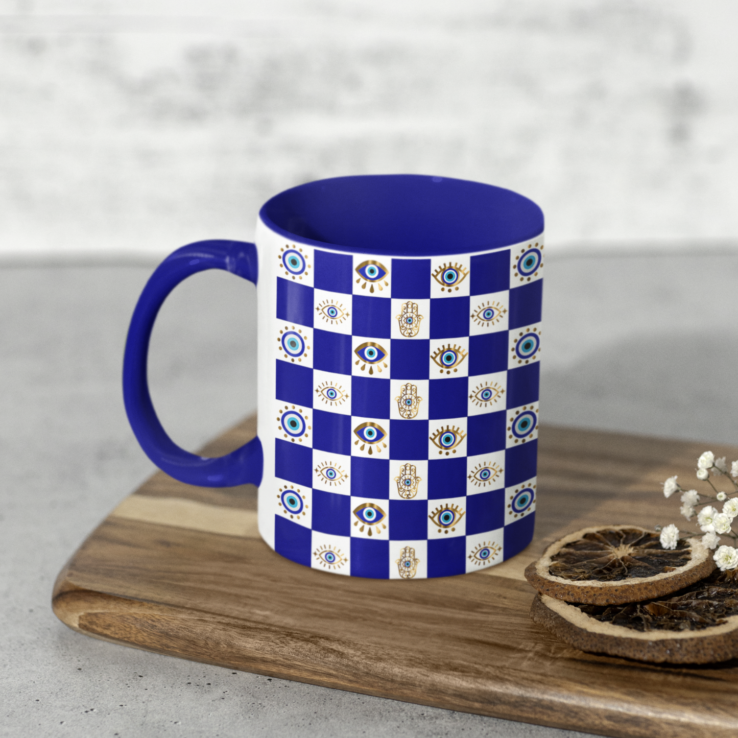 Mug with blue and white checkered pattern on a wooden board with cookies