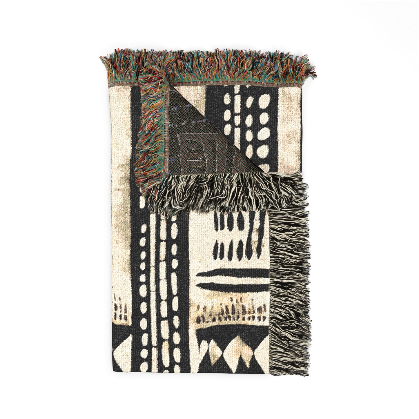 Woven blanket with geometric pattern and fringes on a white background