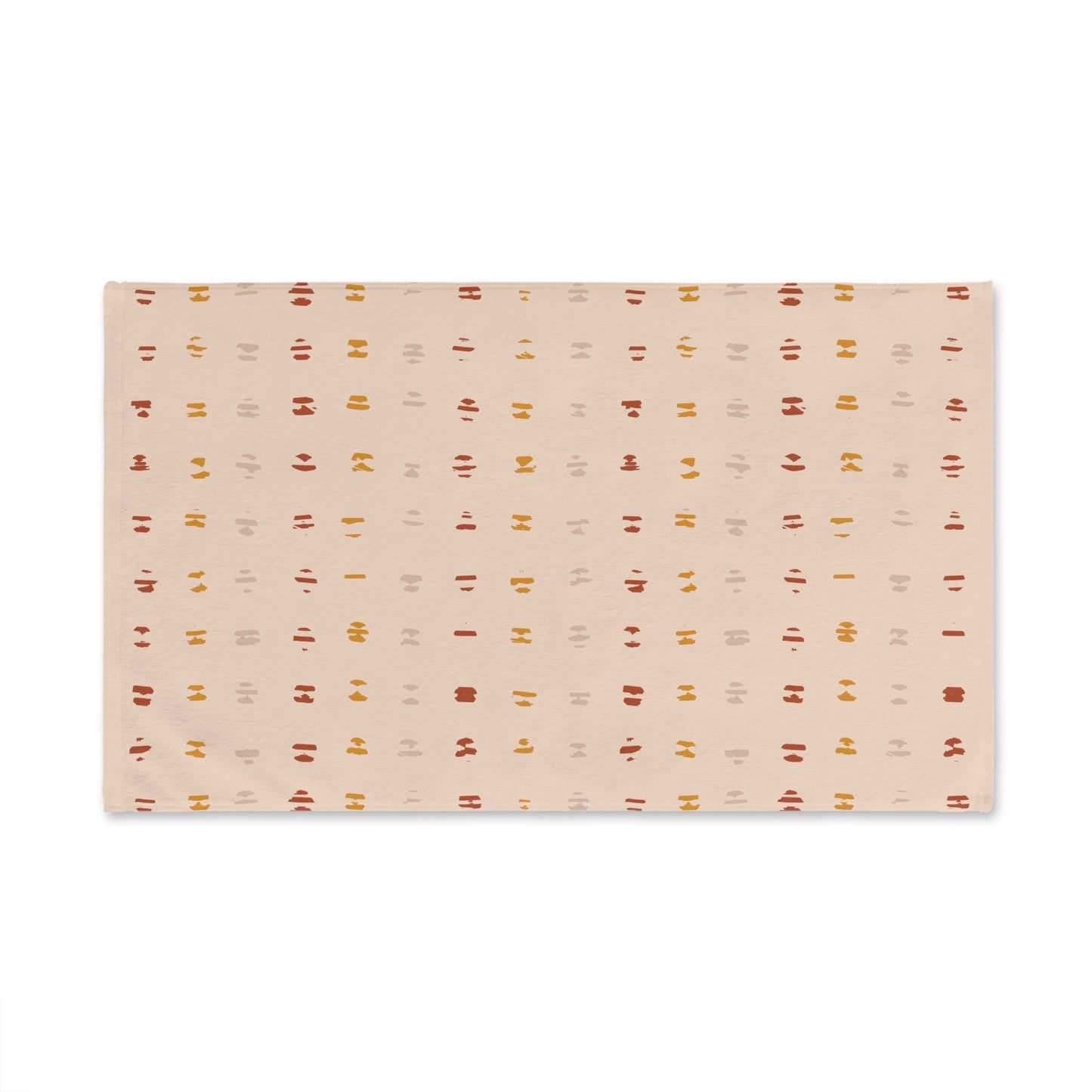 Patterned Towel with a pattern of small, evenly spaced dots on a beige background