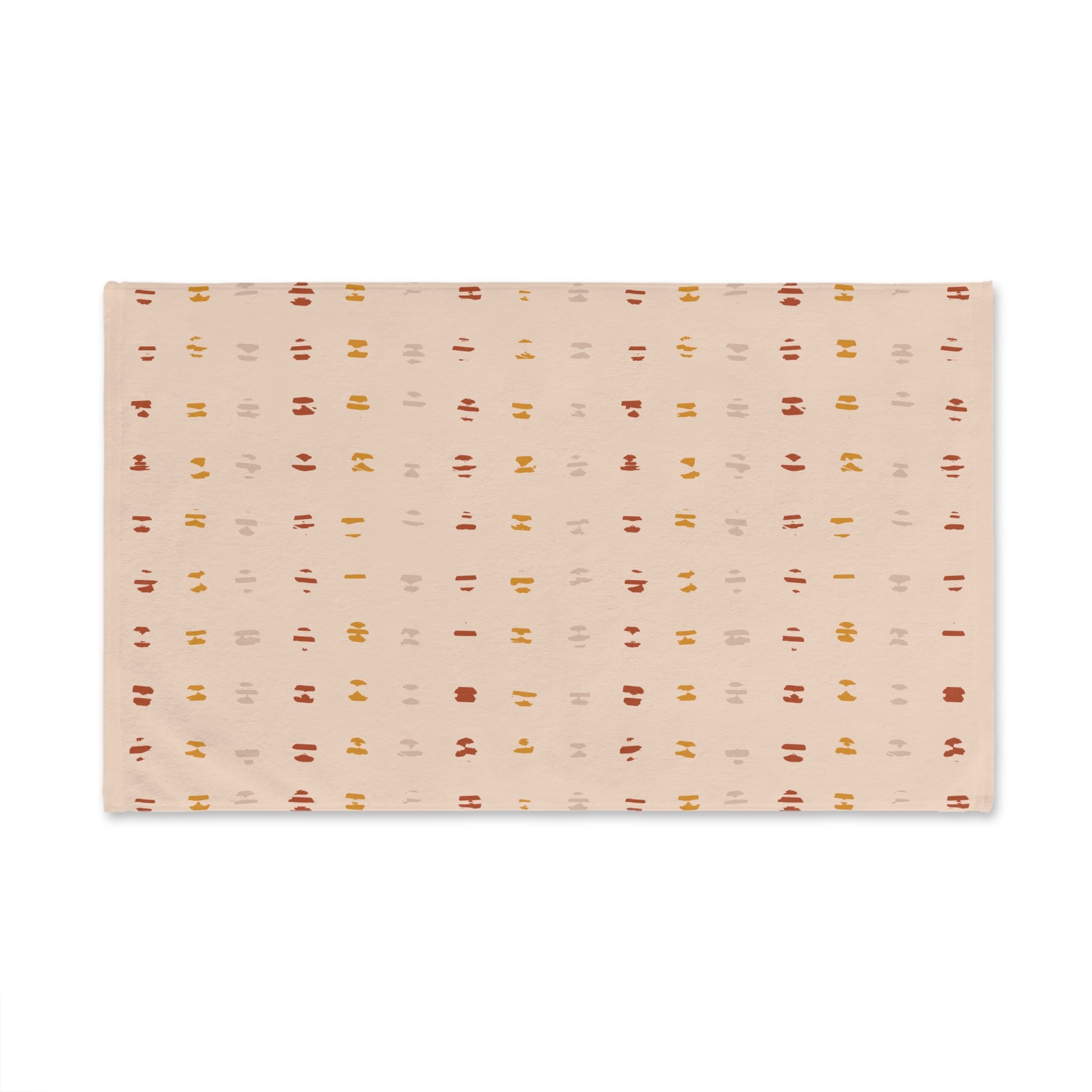 Patterned Towel with a pattern of small, evenly spaced dots on a beige background