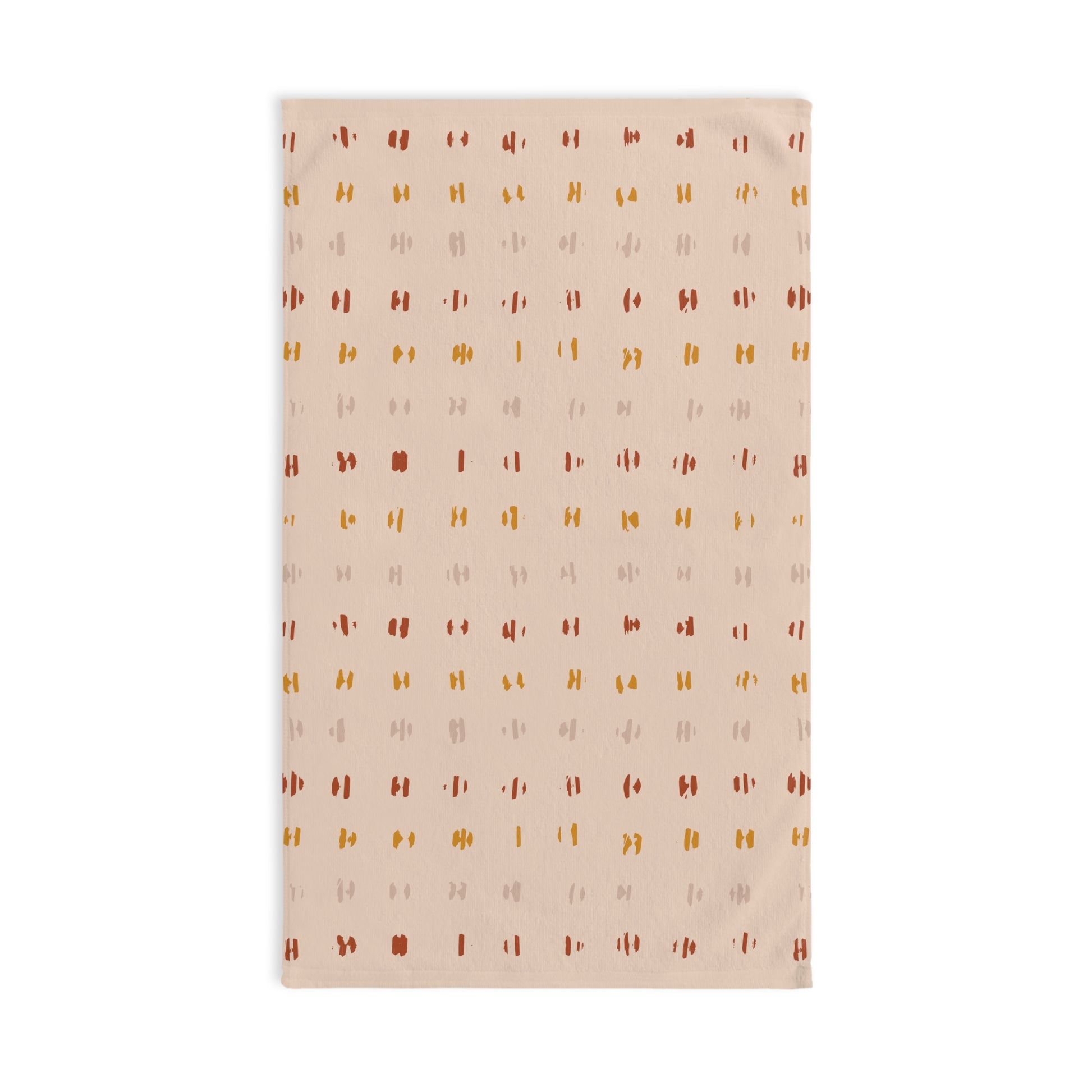 Beige towel with a subtle pattern on a white background