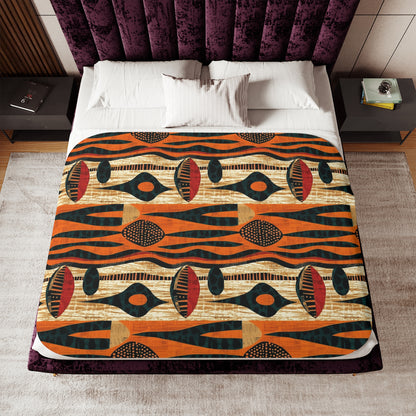 Bed with a patterned quilt in a bedroom setting