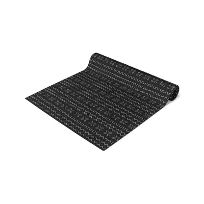 African mudcloth table runner with geometric tribal design for dining décor.