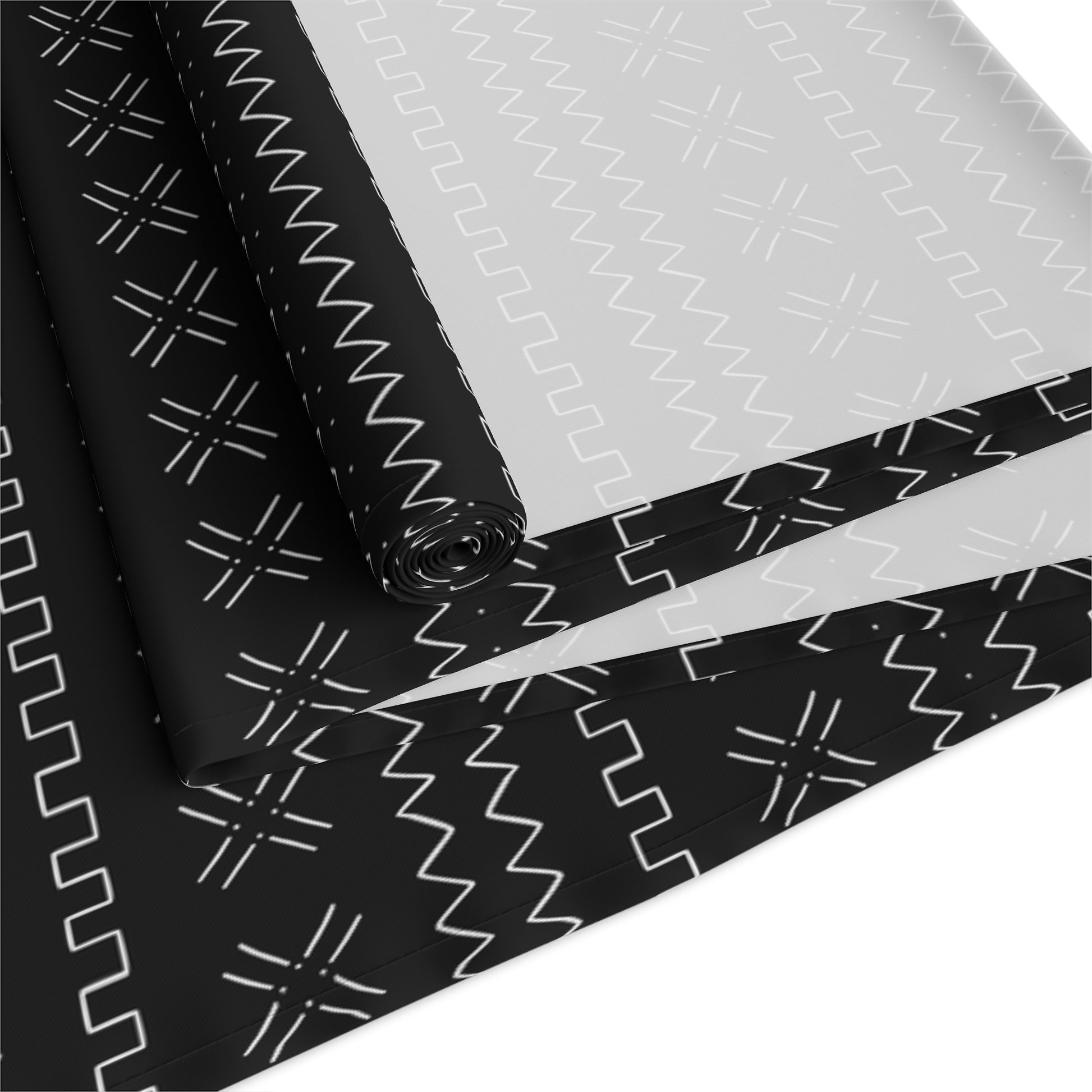 African mudcloth table runner with geometric tribal design for dining décor.