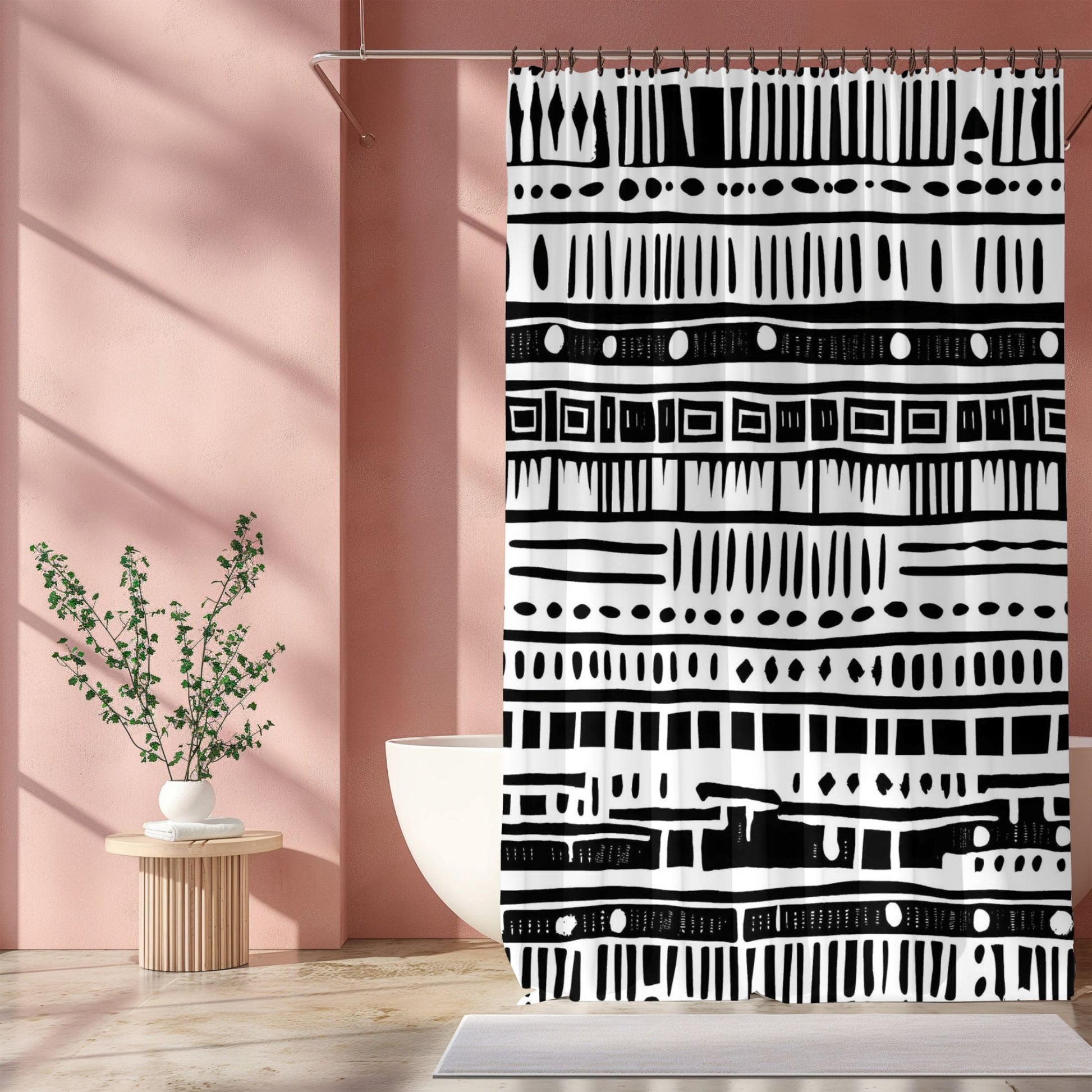 African print shower curtain with black and white pattern in a bathroom setting