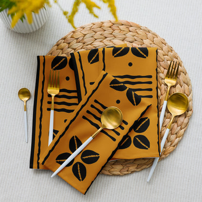 African mudcloth napkins set with geometric tribal design for dining décor.