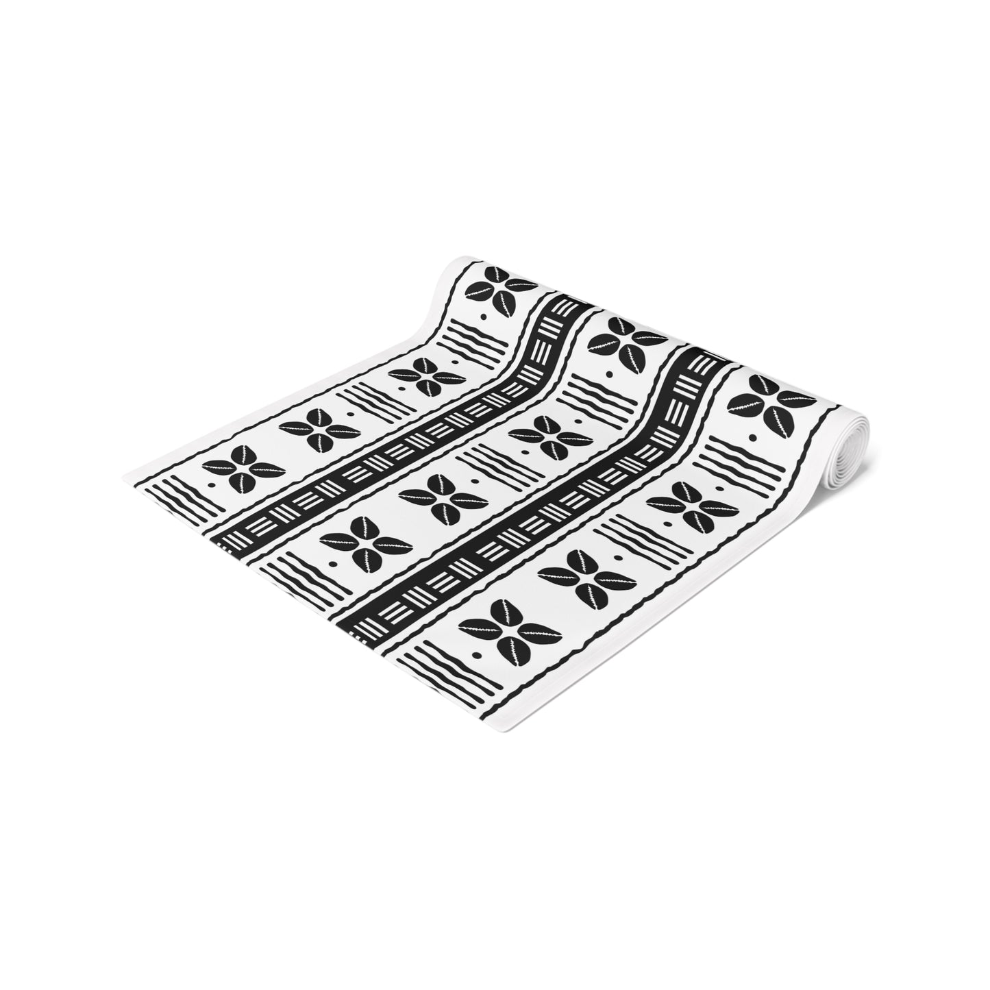 African mudcloth table runner with geometric tribal design for dining décor.