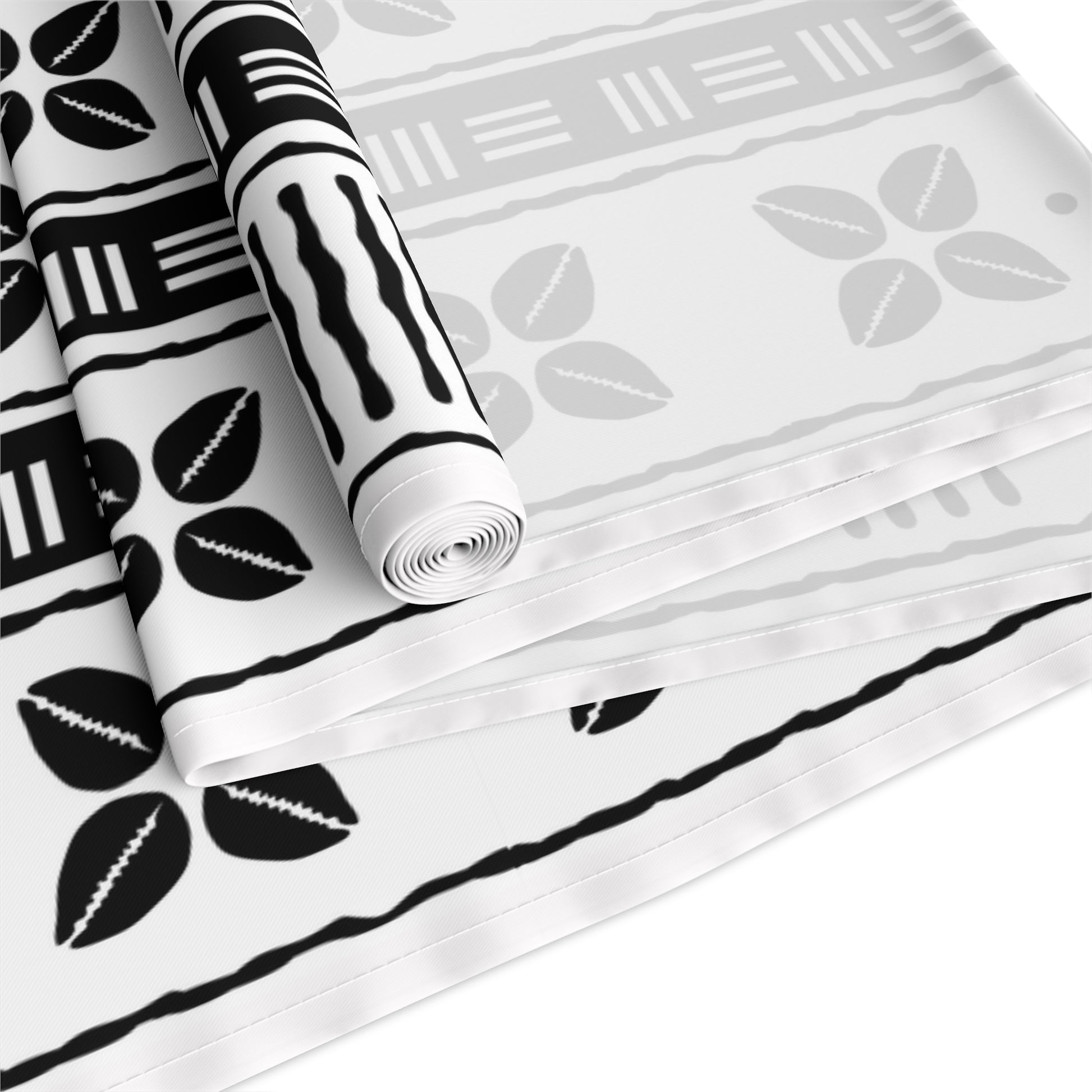 African mudcloth table runner with geometric tribal design for dining décor.