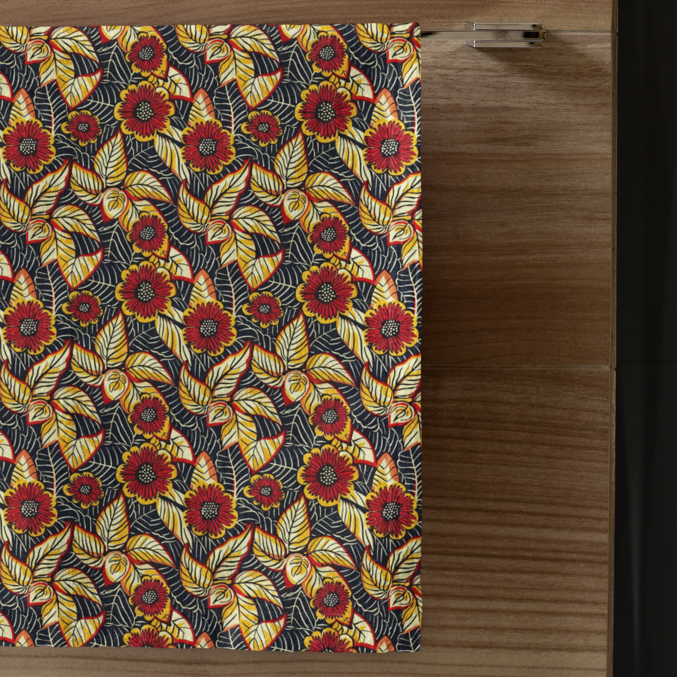 Floral patterned fabric hanging on a wooden surface