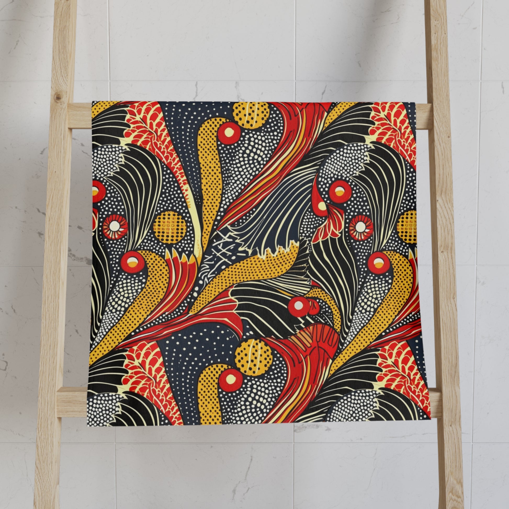 Colorful fabric with a floral pattern on a wooden ladder against a white wall.