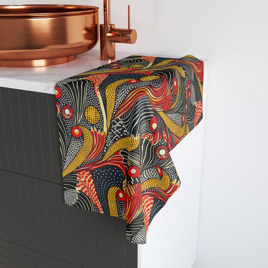 Colorful patterned towel draped over a bathroom cabinet with copper fixtures.