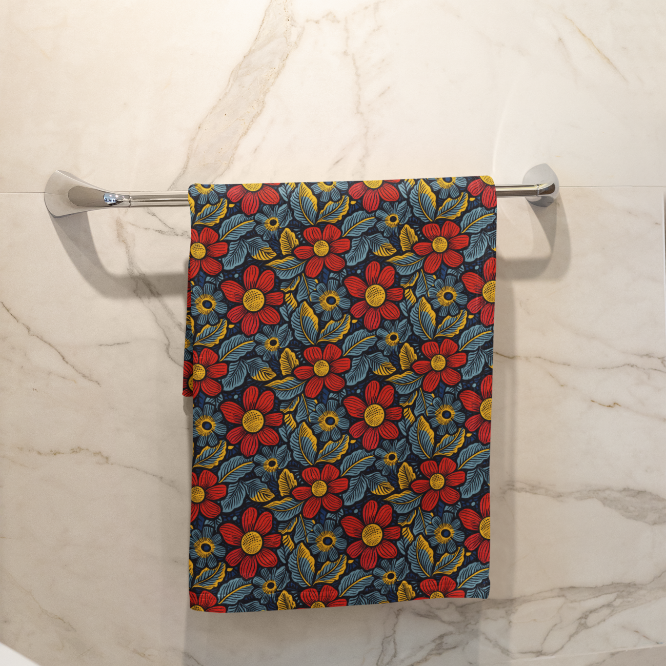 Floral patterned towel hanging on a towel rack in a bathroom.