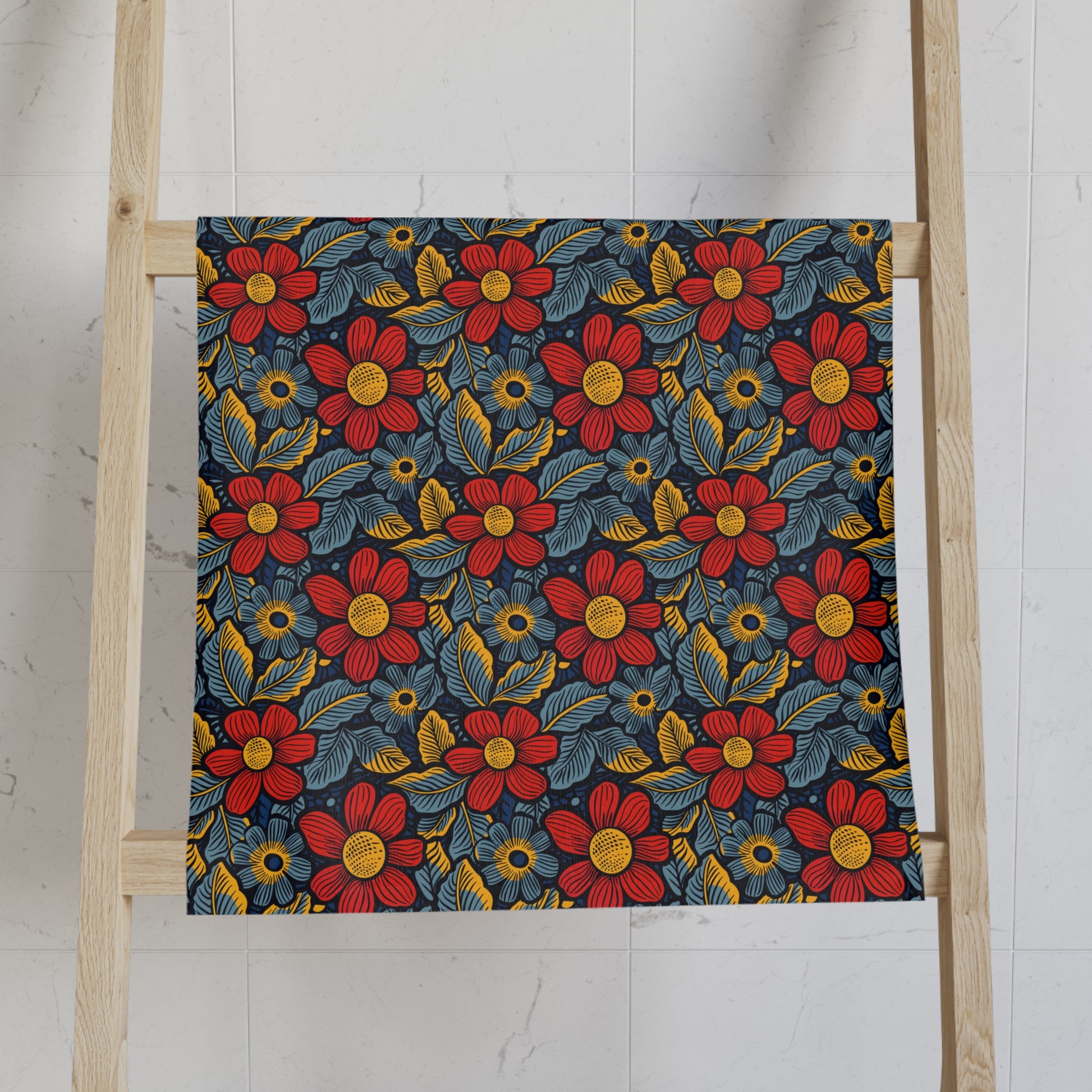 Floral patterned towel on a wooden ladder against a white wall