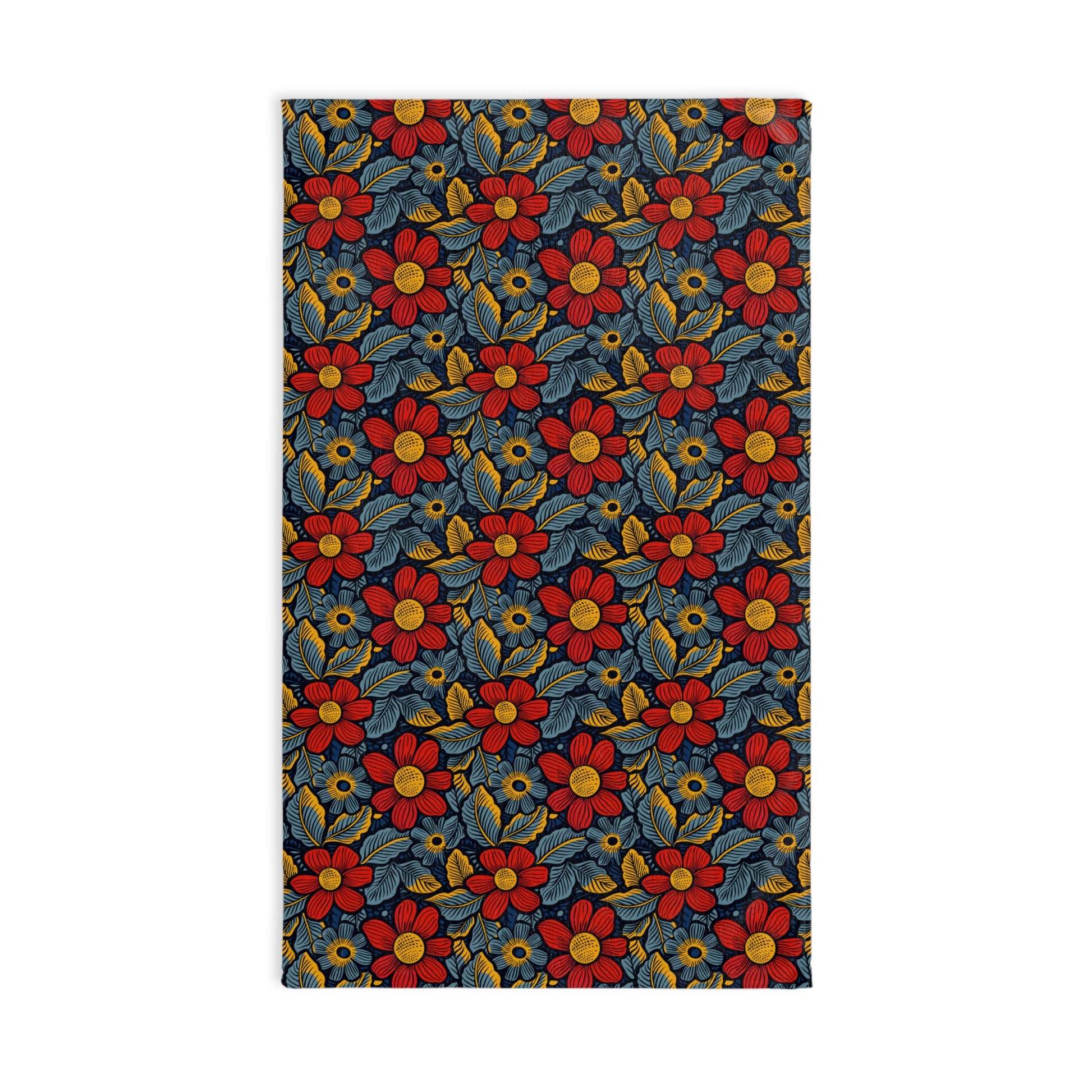 Floral patterned towel with red, yellow, and blue flowers on a dark background