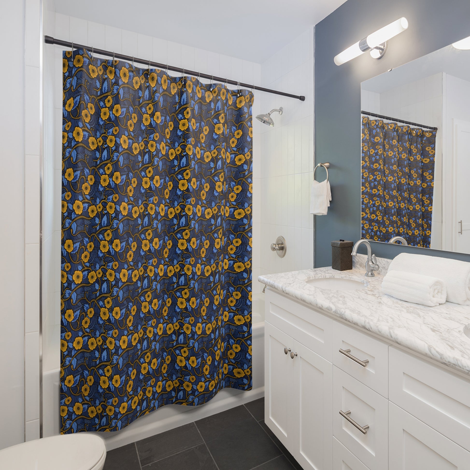Bathroom with a floral shower curtain, white vanity, and mirror.