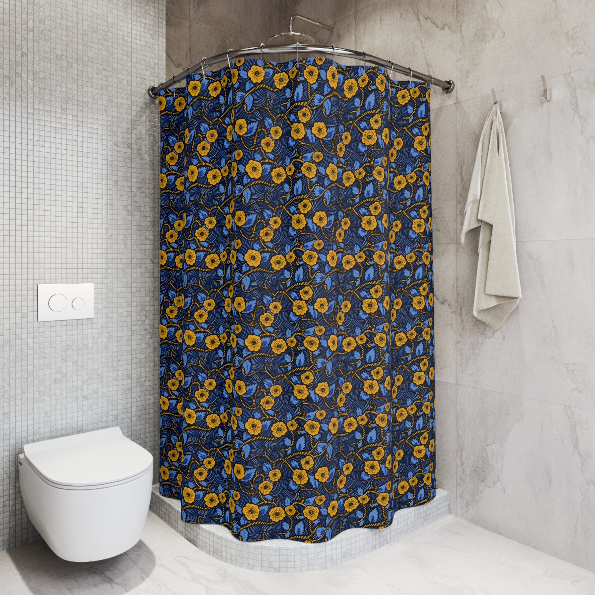 Bathroom with a floral shower curtain, toilet, and towel.