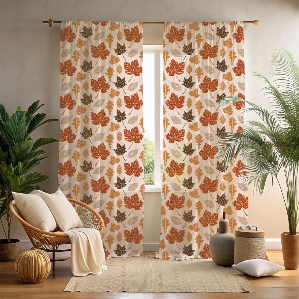 Leaf-patterned curtains in a room with a chair, plants, and decor items.