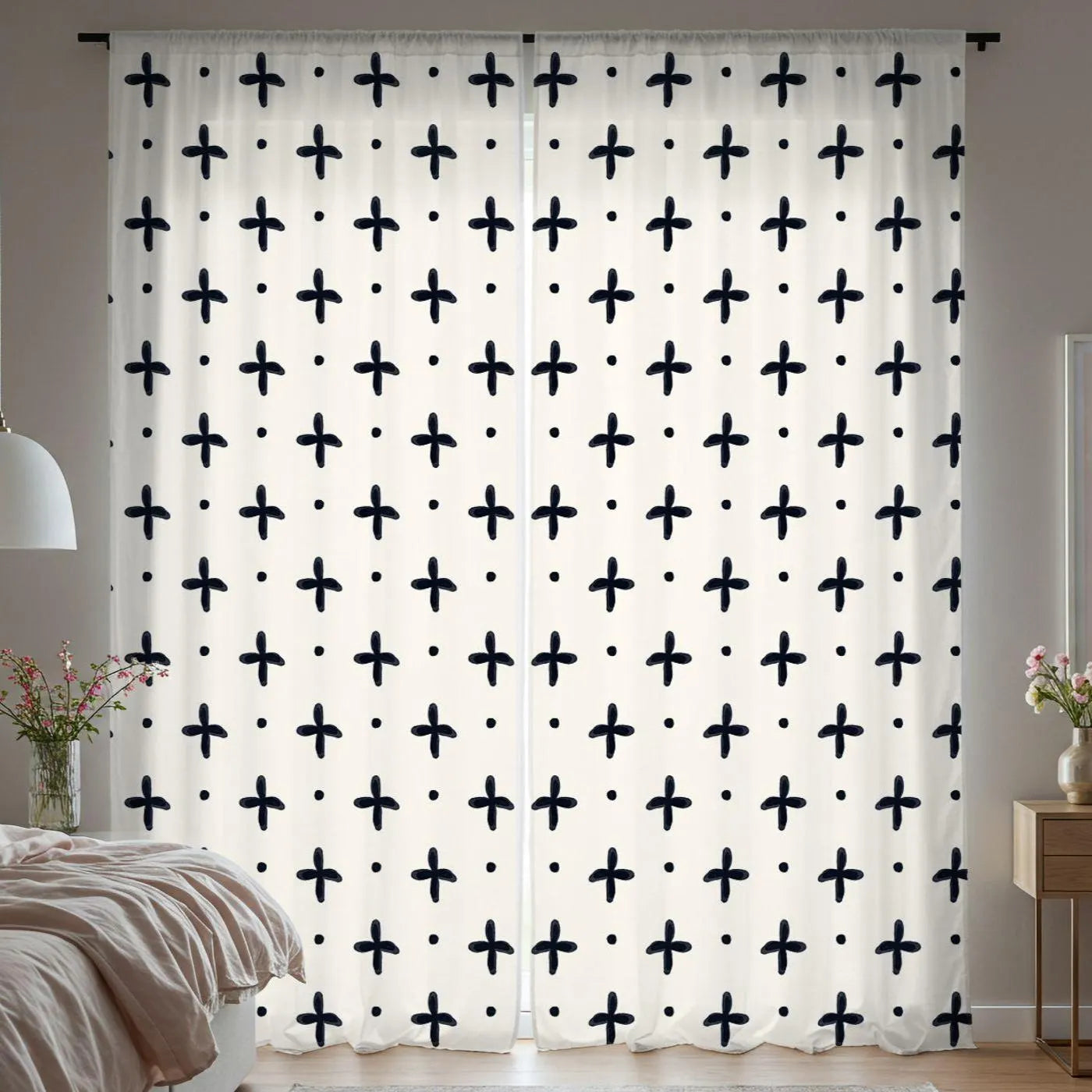 Curtains with black cross pattern on a neutral background