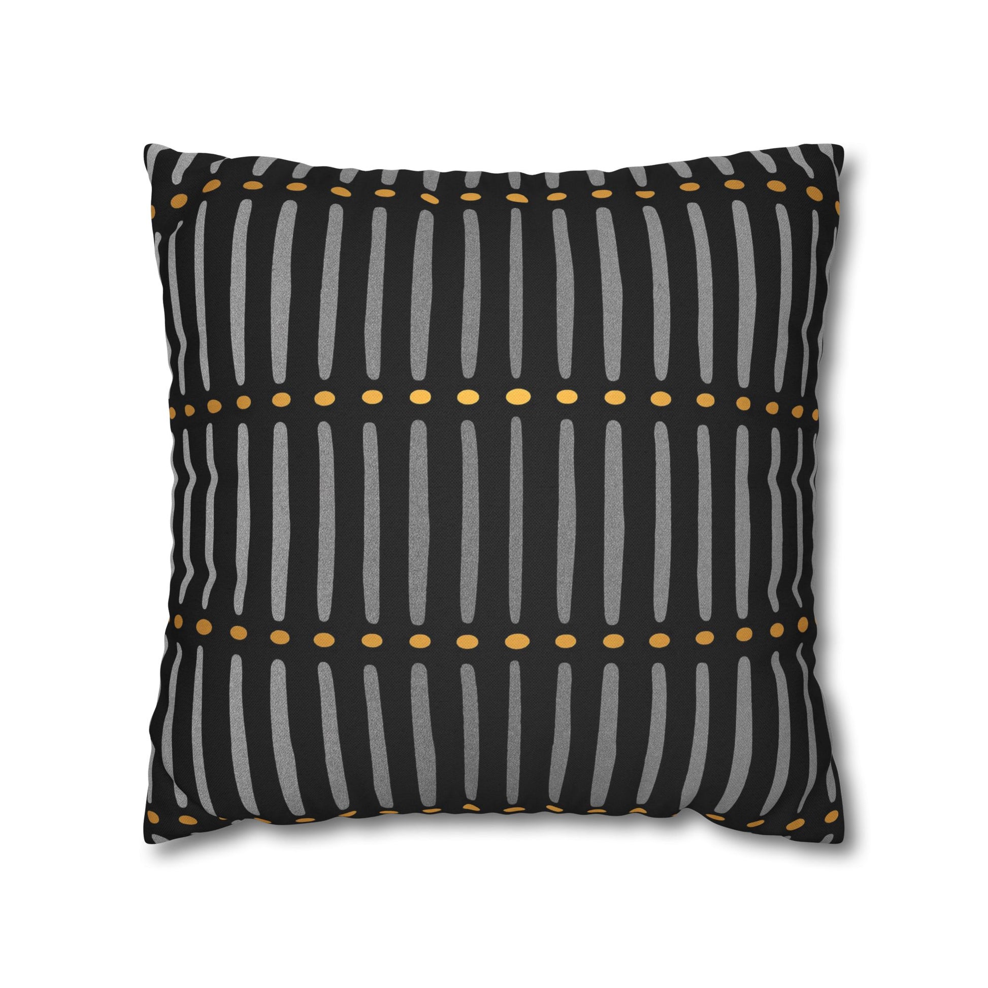 Decorative pillow with black, gray, and yellow pattern on a white background