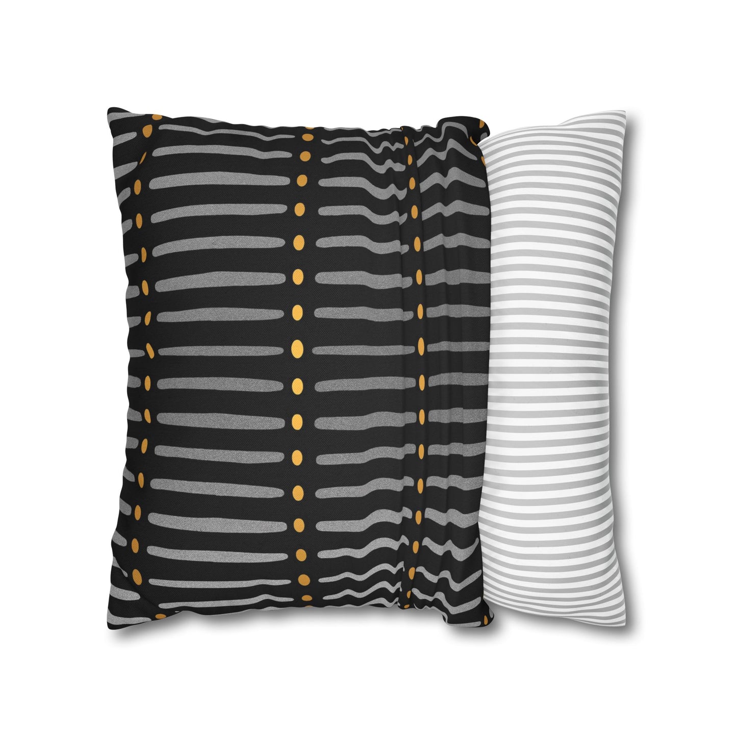 Two striped pillows, one with black, gray, and gold pattern and the other with white and gray stripes, on a white background.