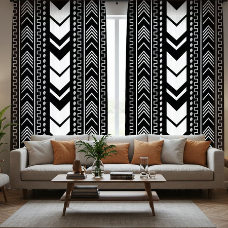 Mudcloth Curtains in a Living room with a sofa, coffee table, and decorative wall art.