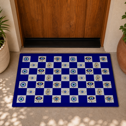 Decorative checkered mat with evil eye pattern on a floor in front of a wooden door.