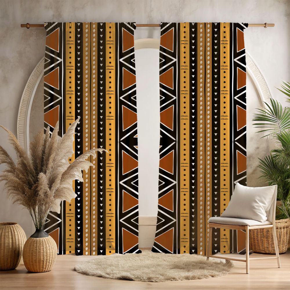 Decorative curtain with tribal pattern in a room with plants and a chair.