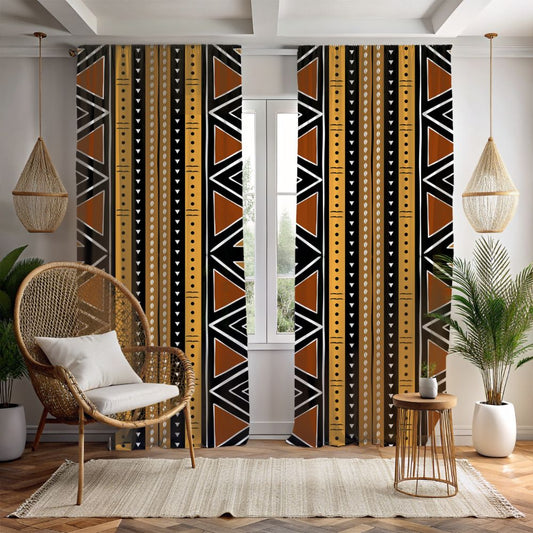 Living room with tribal patterned curtains, wicker chair, and wooden table.