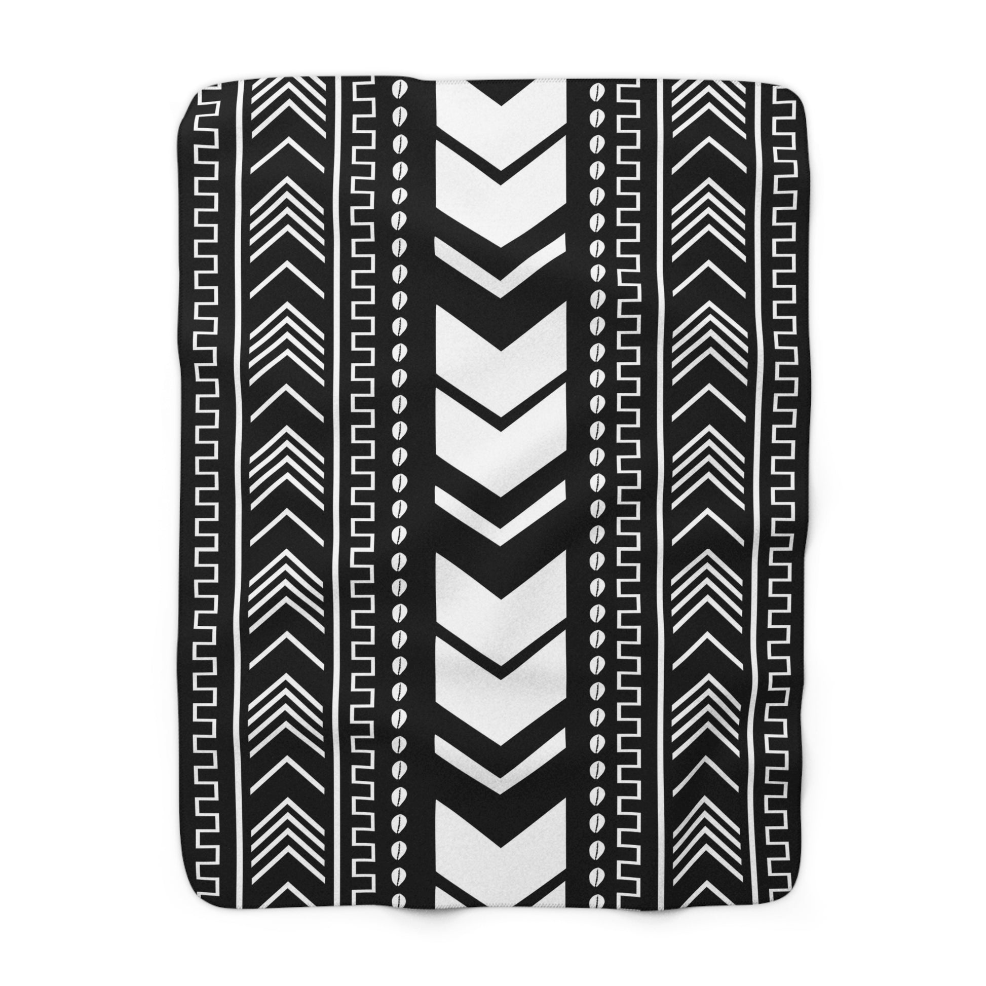 Black and white patterned blanket with tribal design on a white background