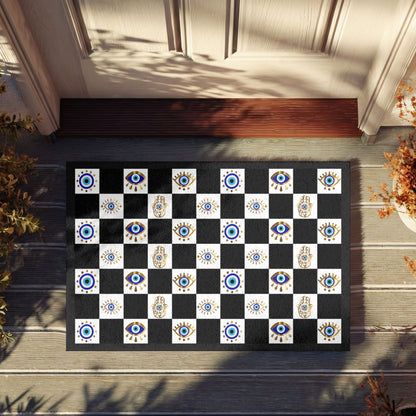Decorative doormat with a checkered pattern on a wooden floor.