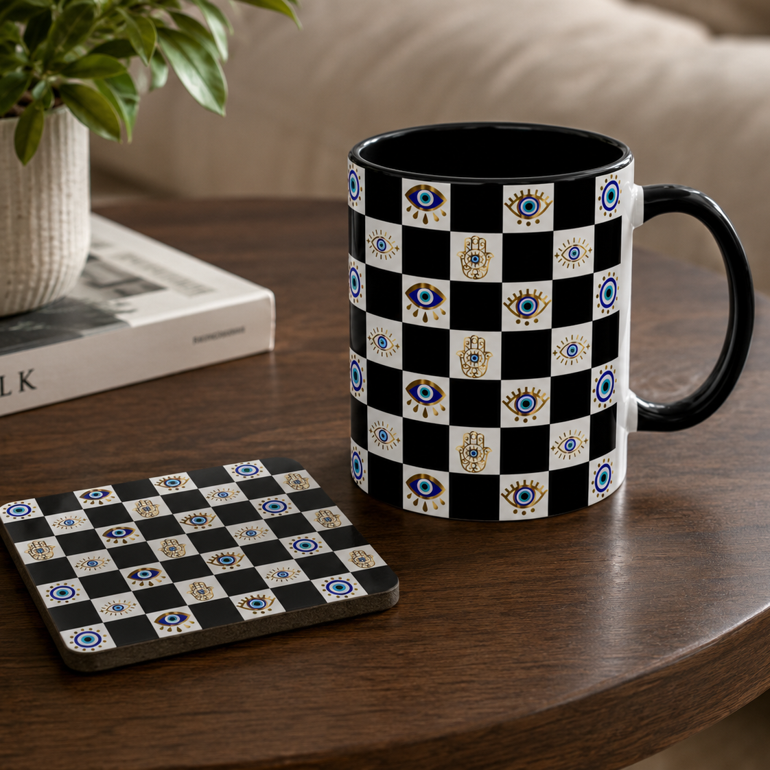 Black and white checkered mug and coaster on a wooden table with a plant and book in the background.