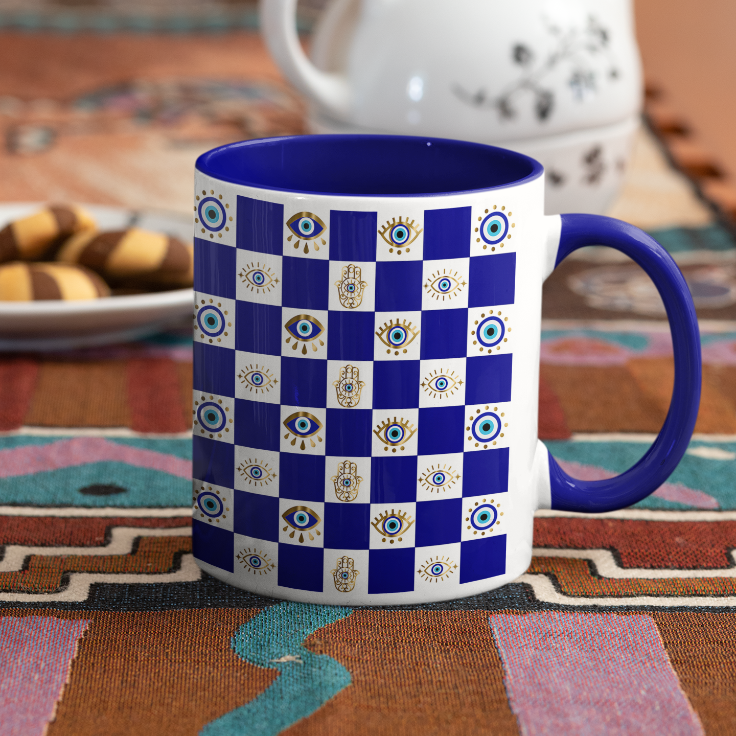 Blue and white checkered mug with a purple handle on a patterned tablecloth.