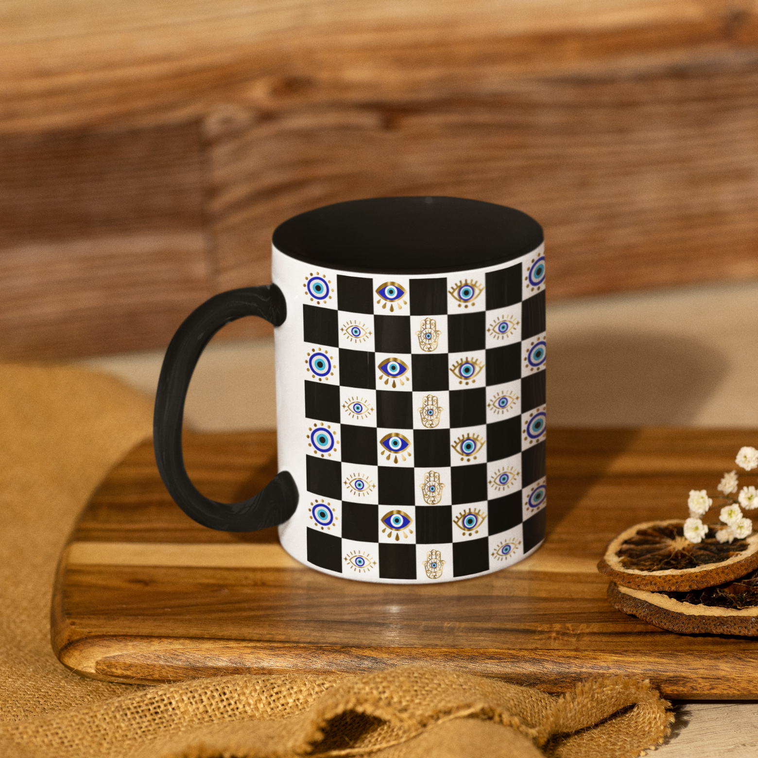 Checkered mug with black handle on a wooden surface