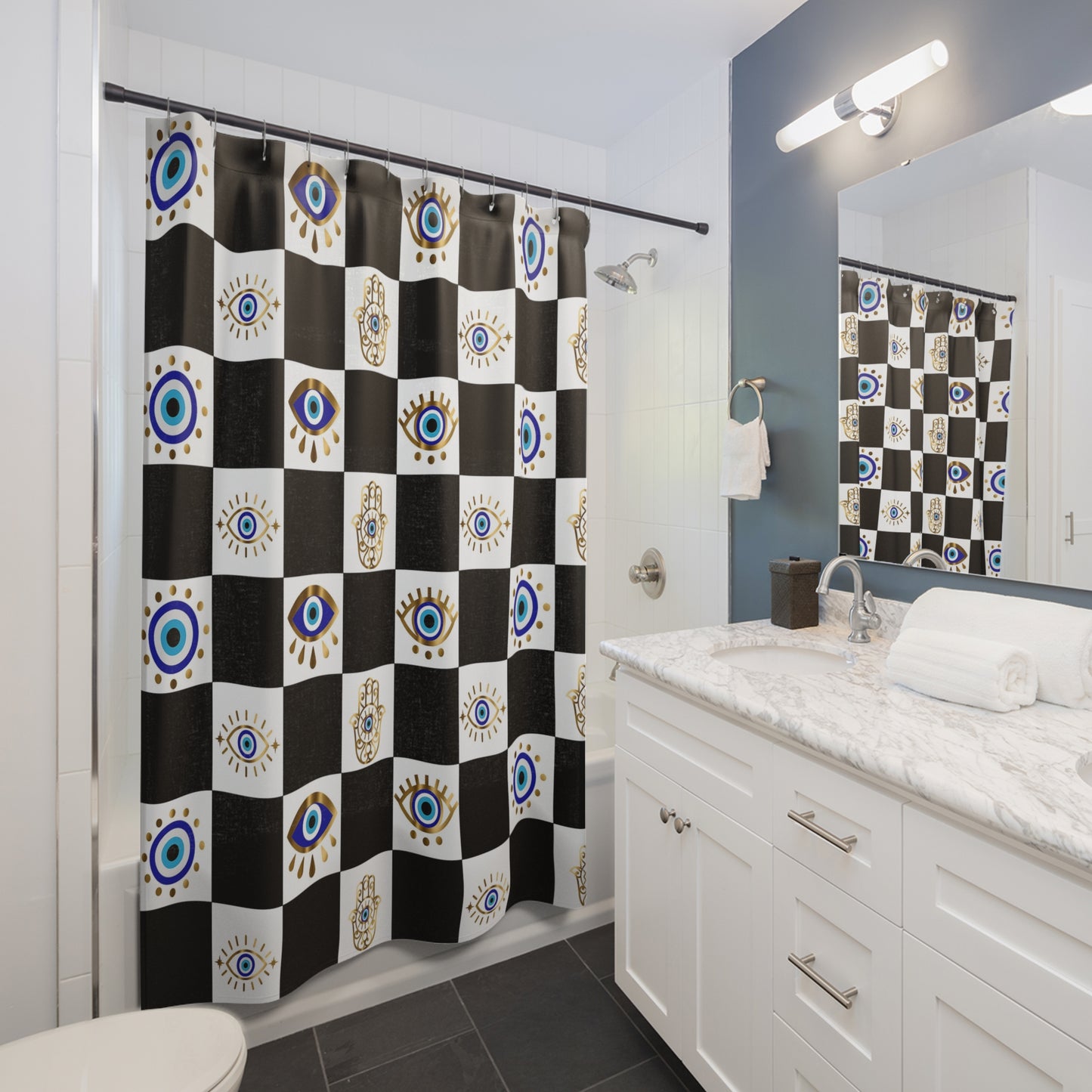 Bathroom with a checkered shower curtain featuring eye designs.