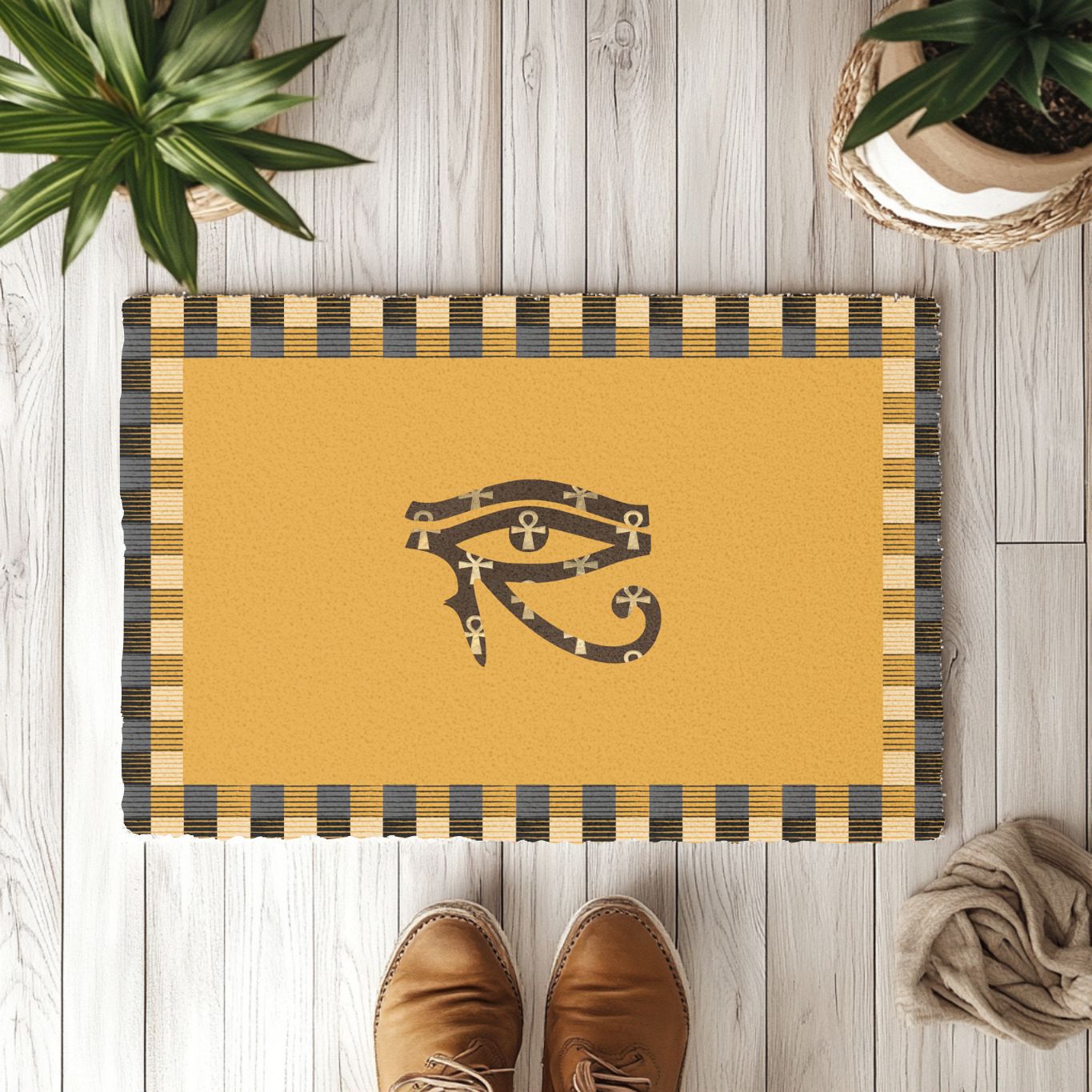 Yellow doormat with eye of horus symbol on a wooden floor