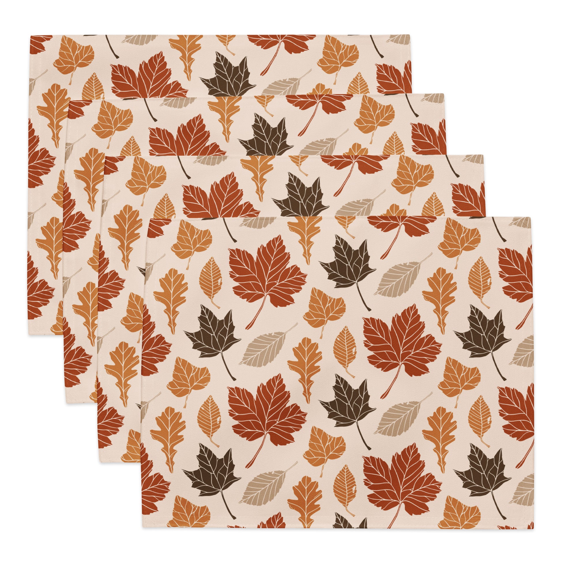 Set of three placemats with autumn leaf pattern on a white background