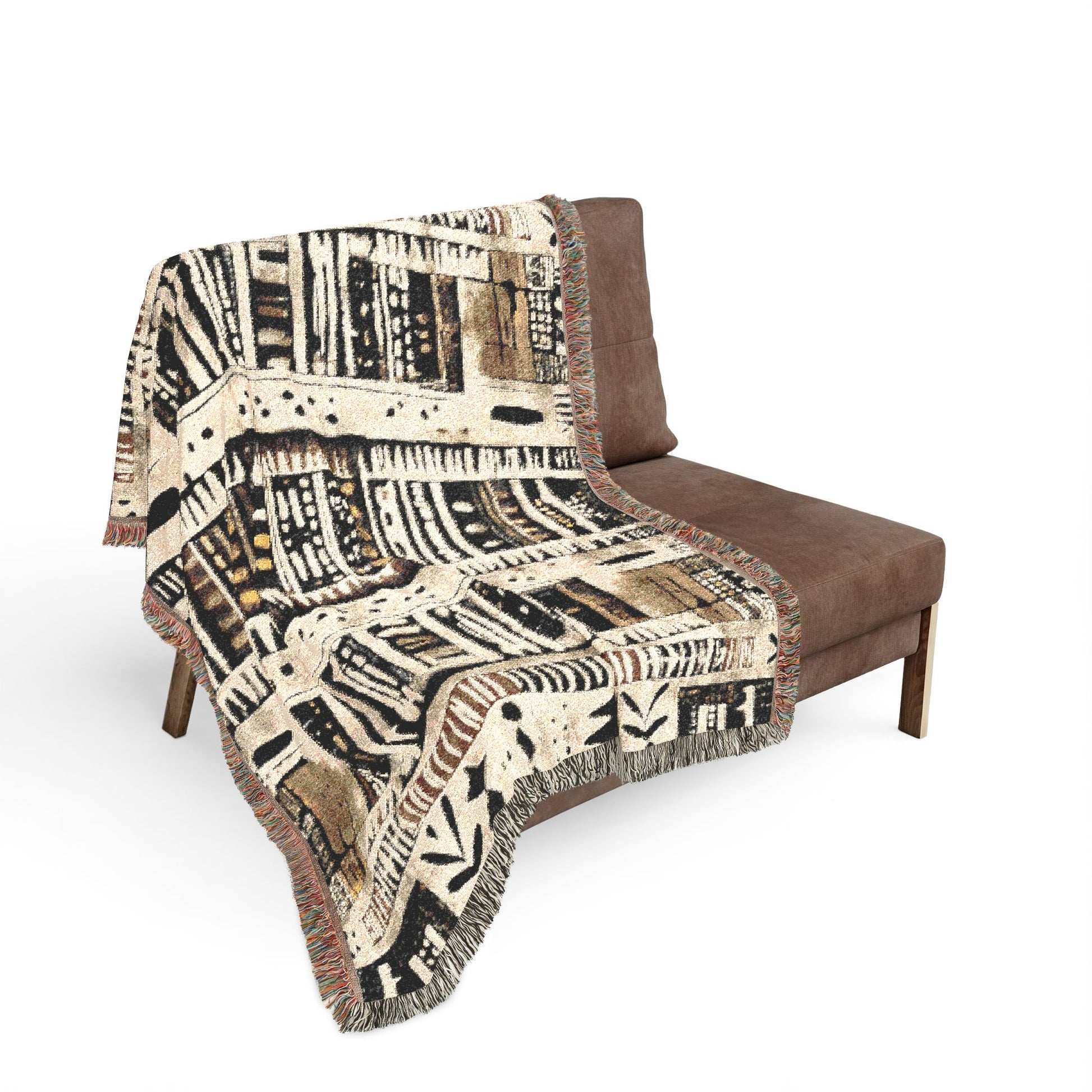 Brown chair with a patterned blanket draped over it on a white background