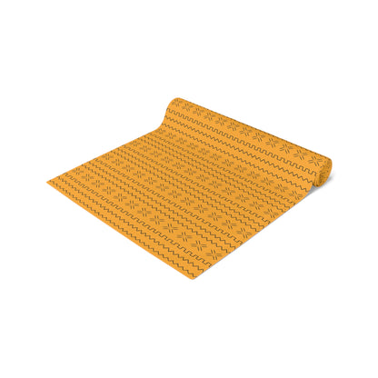 African mudcloth table runner with geometric tribal design for dining décor.