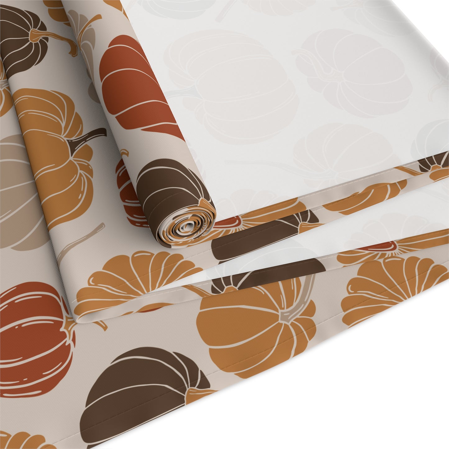 Table runner with pumpkin pattern on a white background