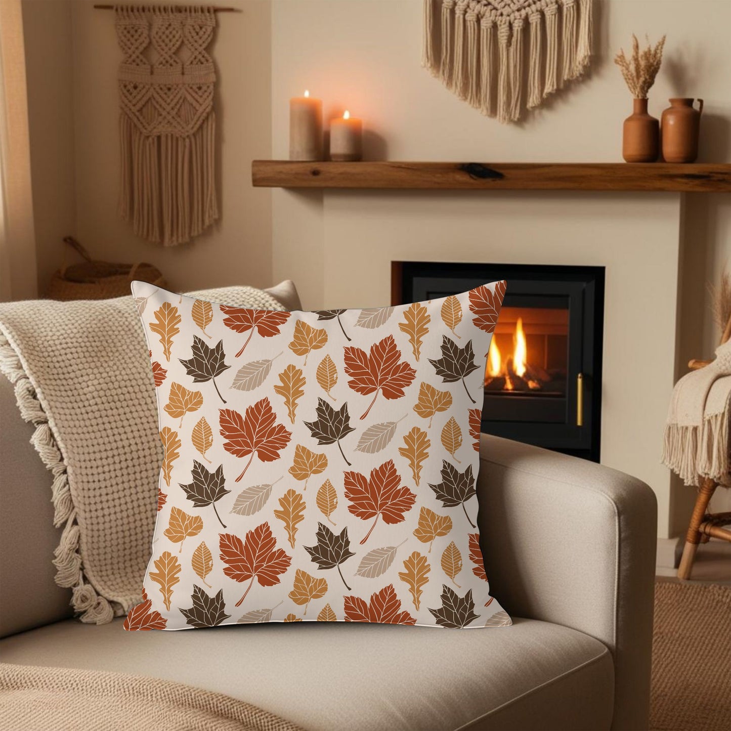 Decorative pillow with autumn leaf pattern on a sofa in a cozy living room with a fireplace.