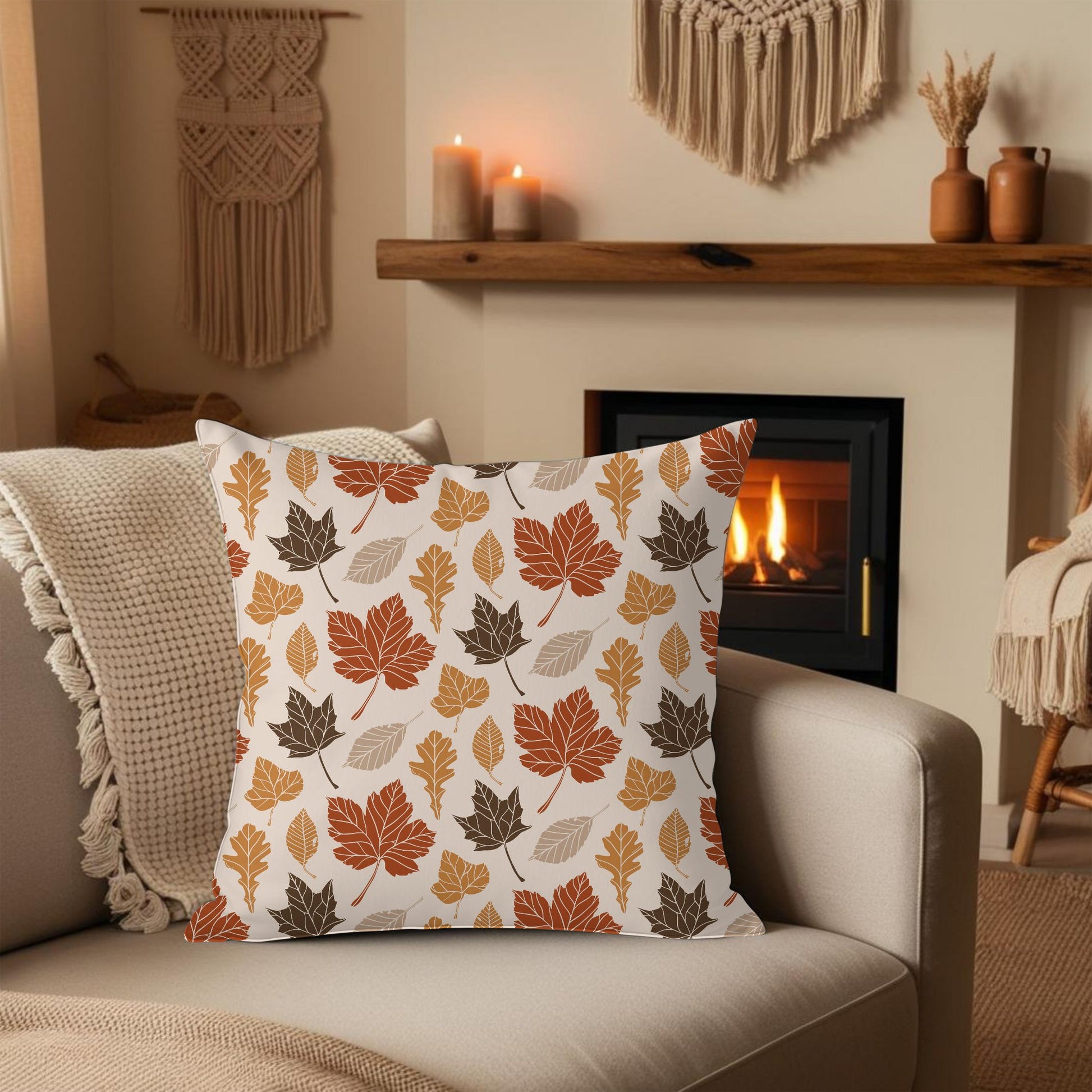 Decorative pillow with autumn leaf pattern on a sofa in a cozy living room with a fireplace.