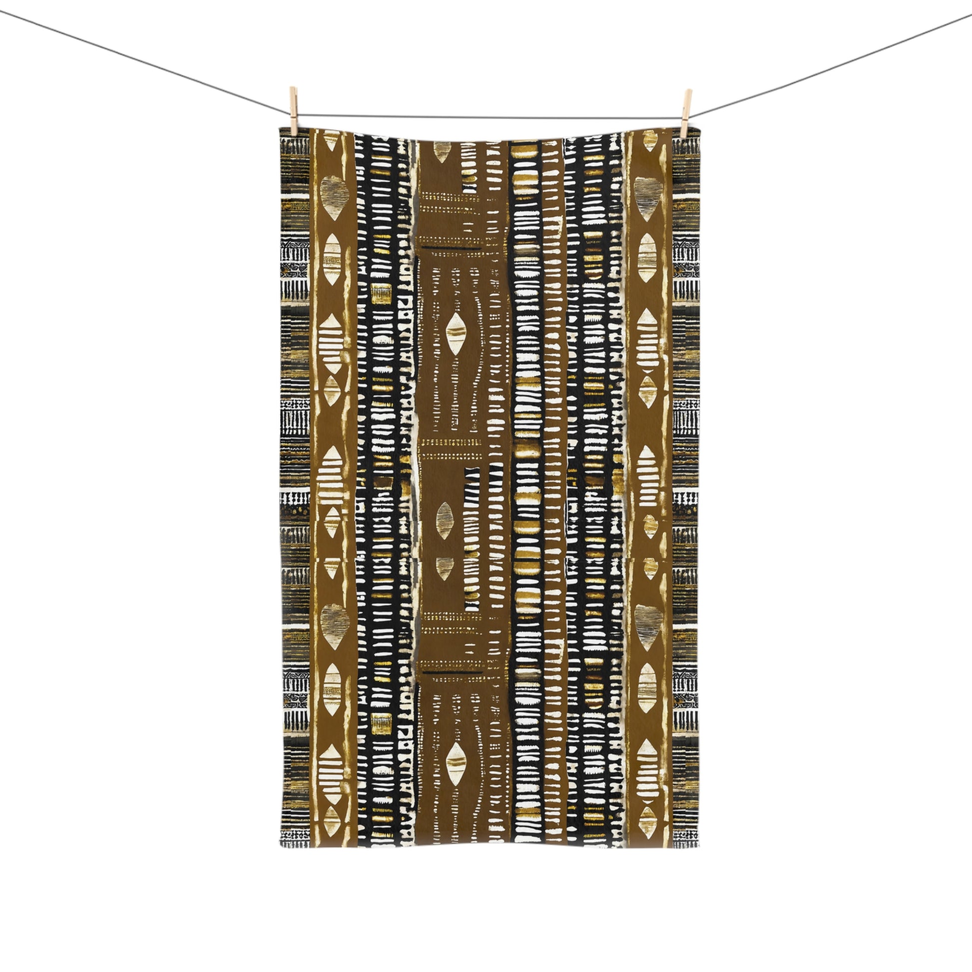 African print towel with a pattern of vertical lines and shapes on a white background