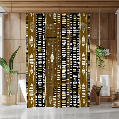 Mudcloth Shower curtain with black, gold, and white geometric pattern in a bathroom setting.