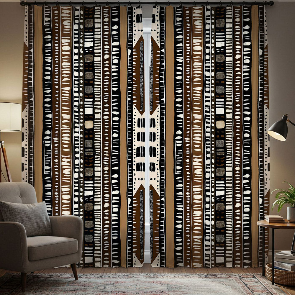 Patterned curtains in a living room with a chair and table.