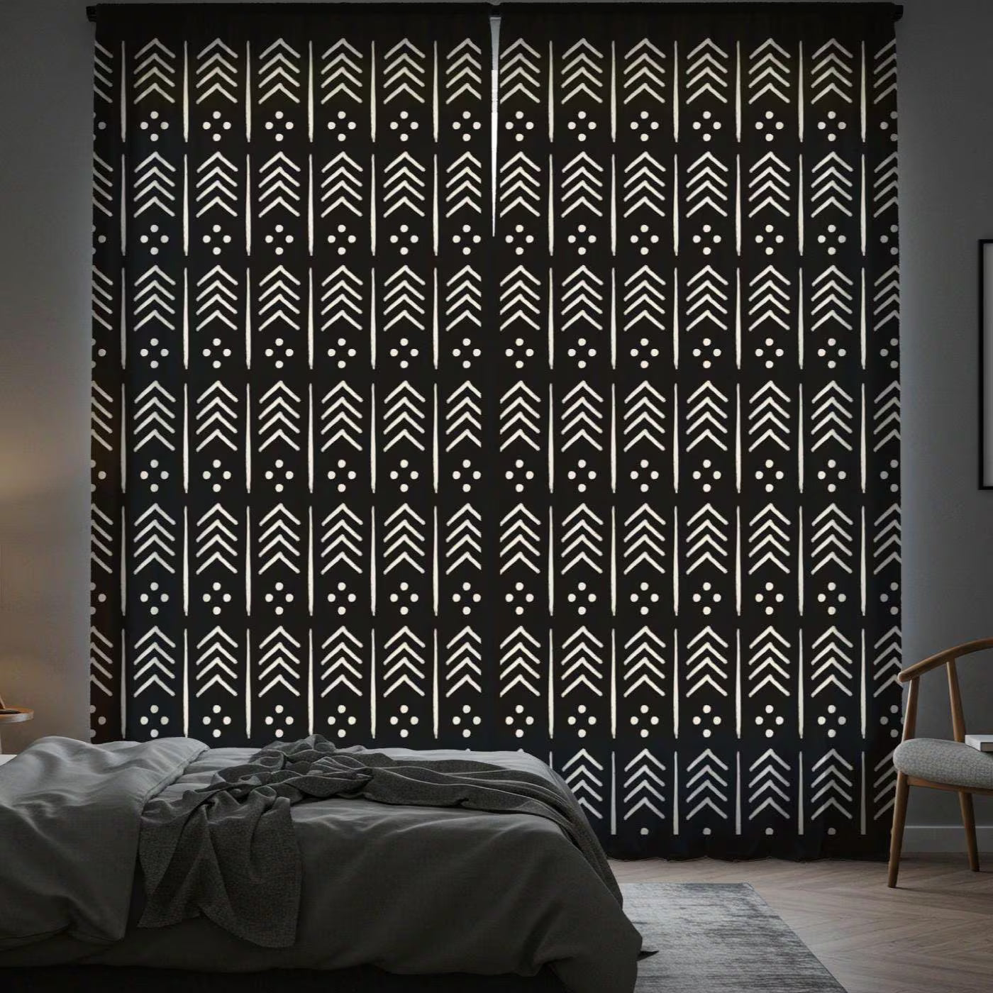 Black and white patterned curtain in a bedroom setting