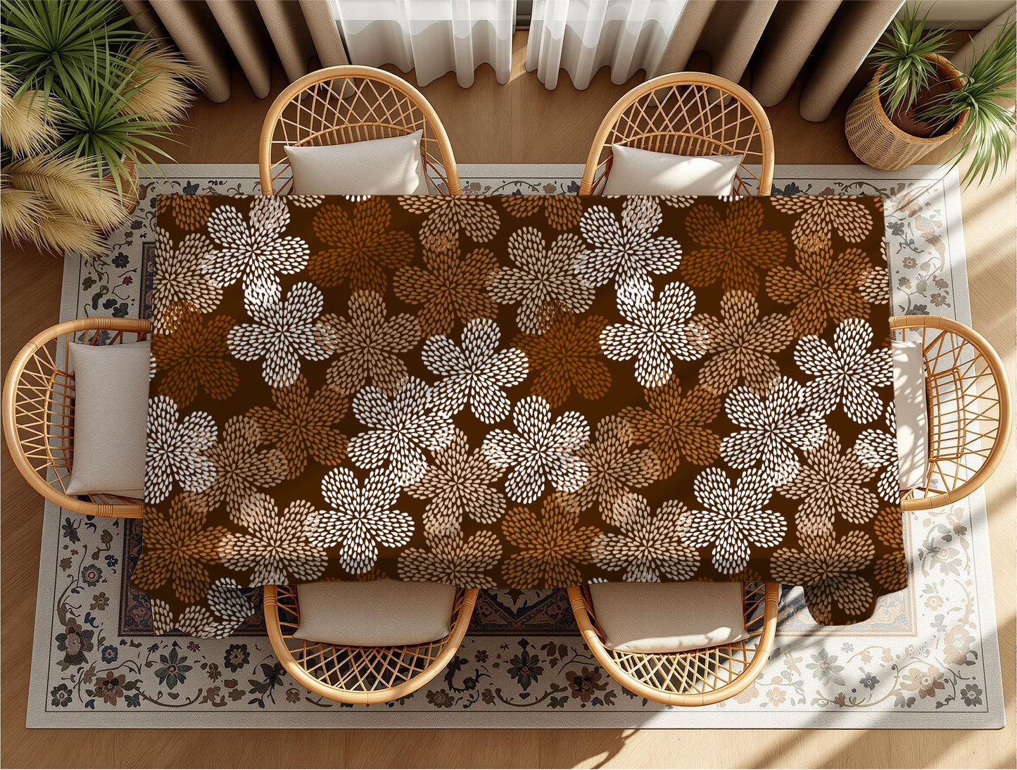 Mudcloth Floral-patterned rug on a wooden floor with wicker chairs.