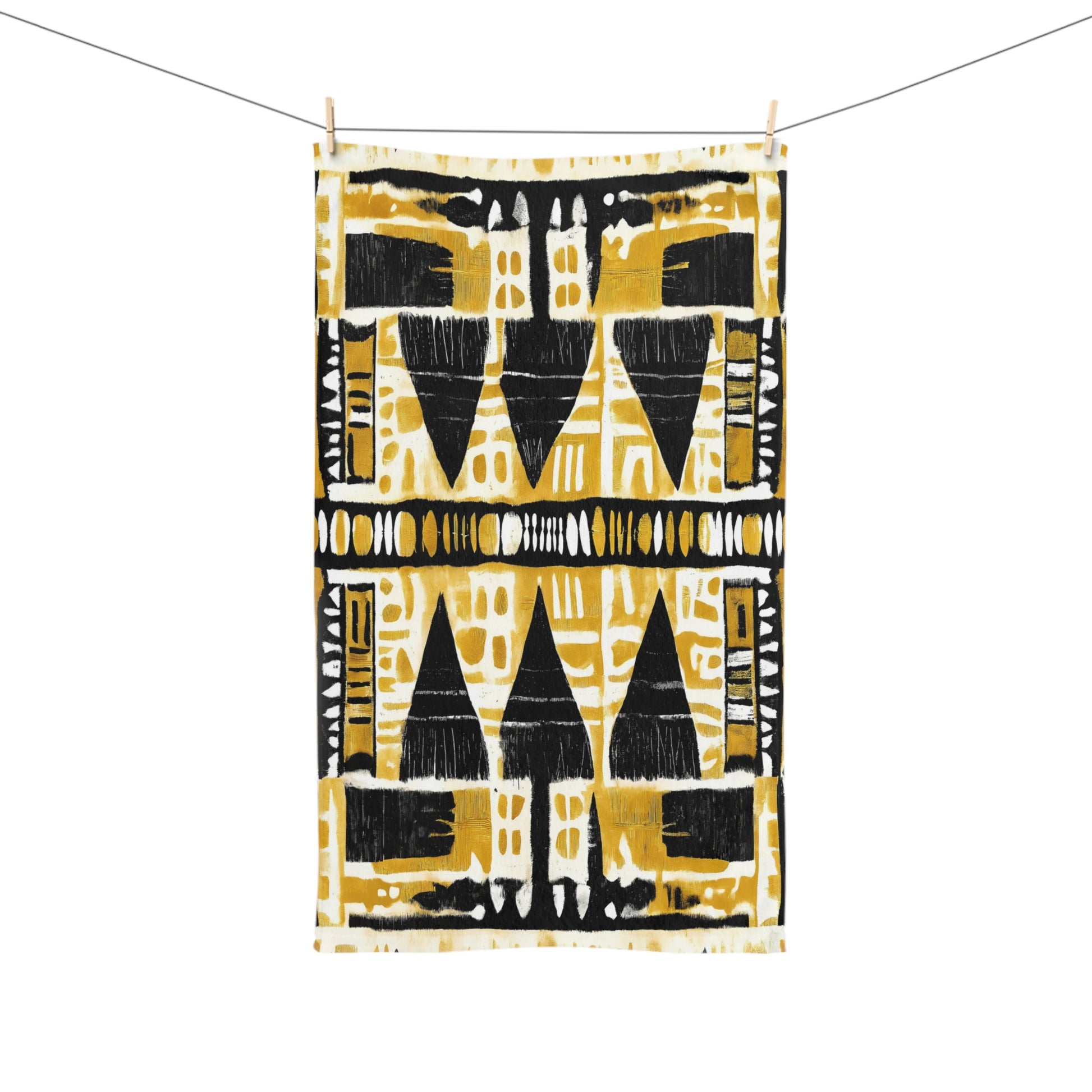 African print towel with black and yellow geometric pattern on a white background