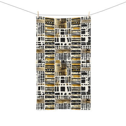 African print towel with geometric pattern hanging on a line
