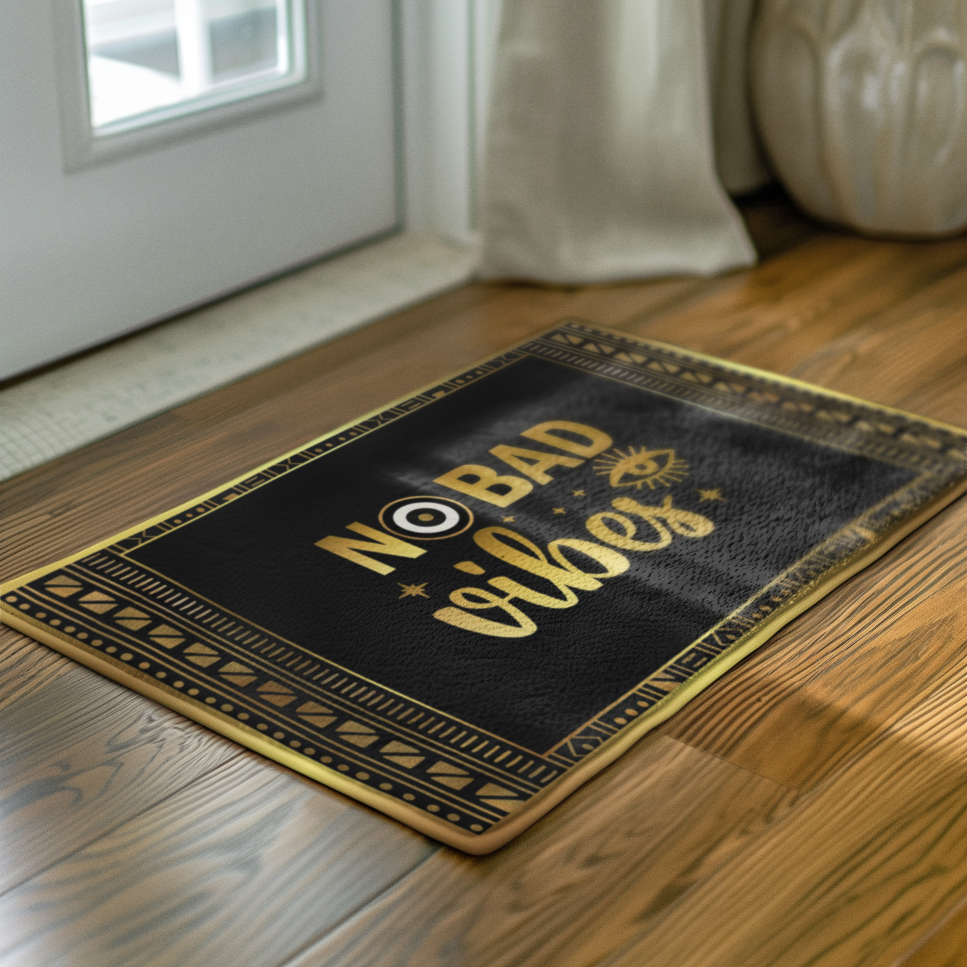 Decorative doormat with 'No Bad Vibes' text on a wooden floor.